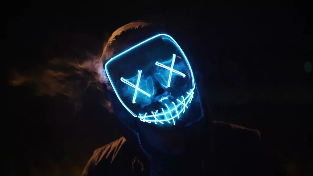 man wearing mask hardstyle festival