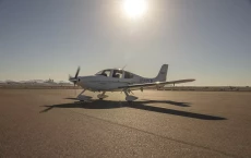 Parked Cirrus SR22 private aircraft at a regional airfield.